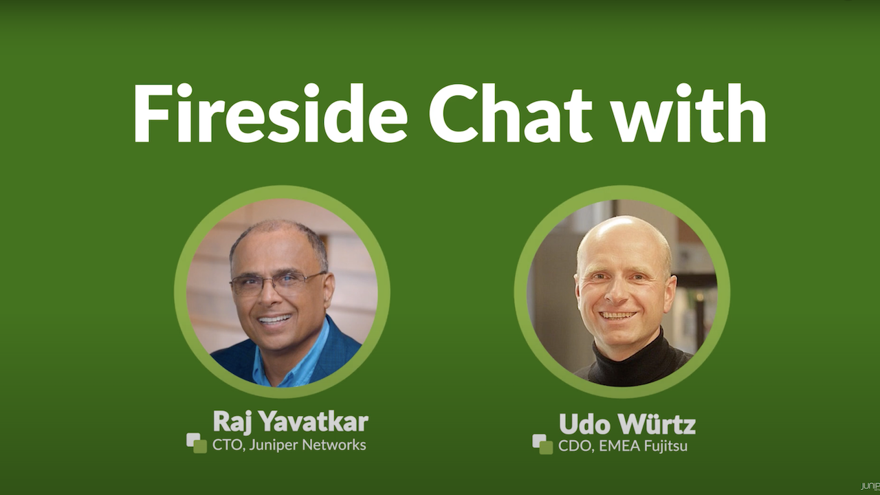Slide that reads, “Fireside Chat With Fujitsu's Udo Würtz and Juniper's Raj” with photos of each man.
